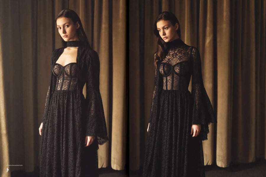 Long black lace gothic dresses with corseted bodices and bell sleeves in dramatic side light